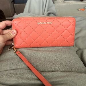 Michael Kors coral colored leather wallet